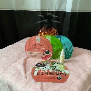 4 Pack of face masks and Caudalie serum sample